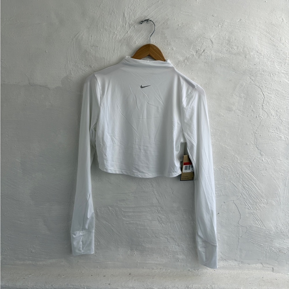 white Nike Dri-FIT One Luxe
Women's Long-Sleeve Cropped Top - Picture 1 of 12